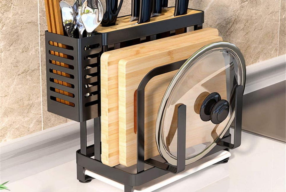 cutting boards and pot lids in storage rack