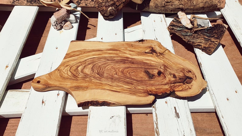 natural wood cutting board in irregular shape