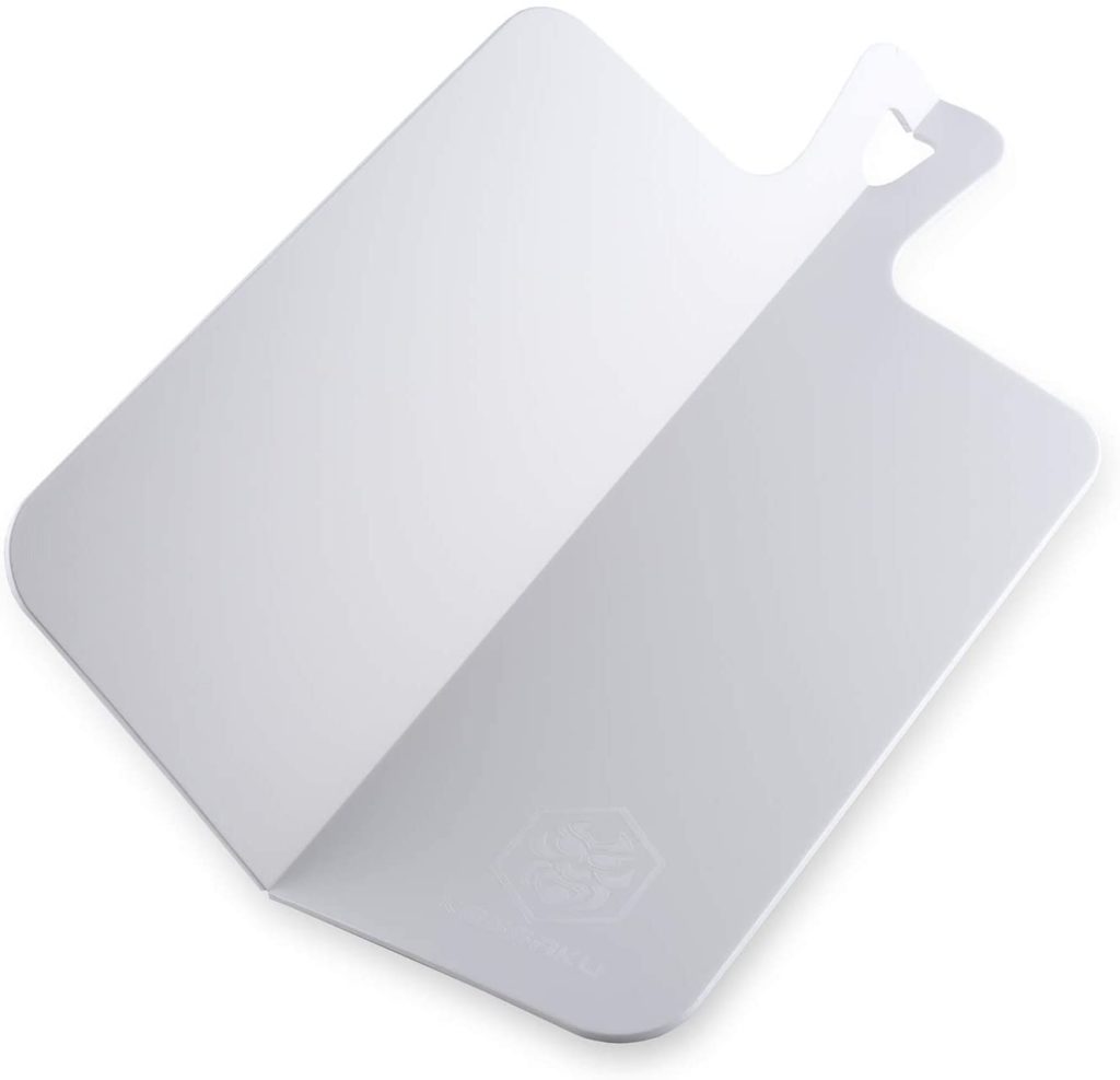 white foldable cutting board that bends into two pieces