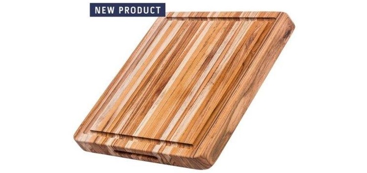 cutting board with hand grips and juice canal