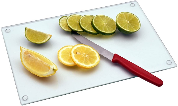 cutting board with lime and lemon