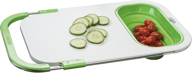 adjustable cutting board with cucumber and tomatoes