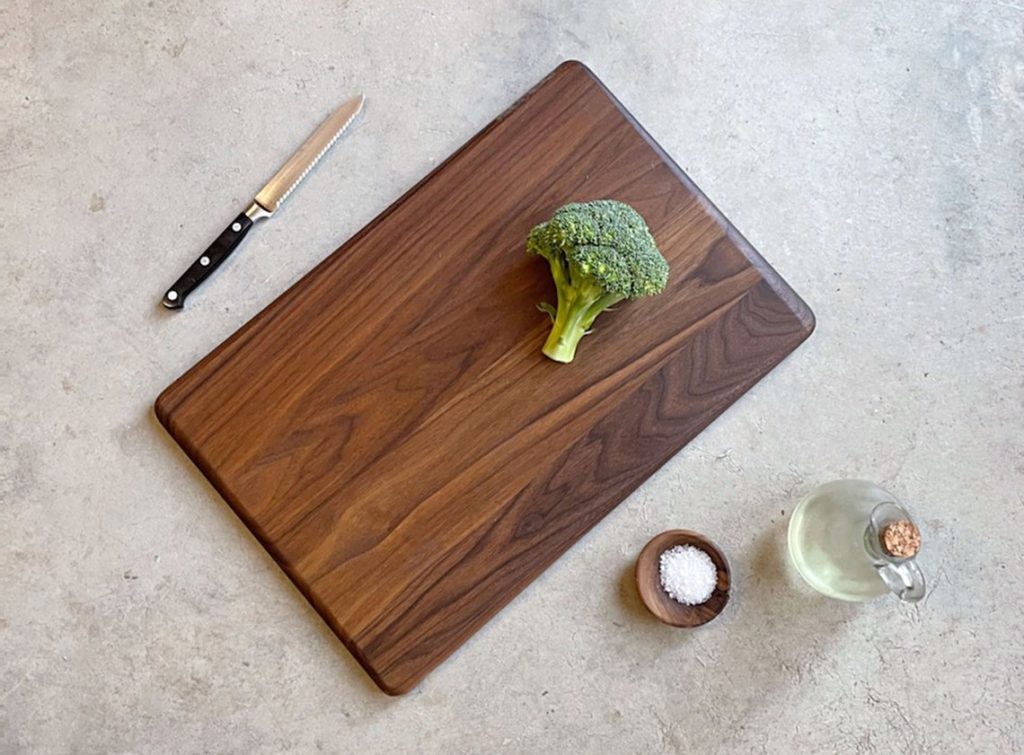rounded walnut cutting board