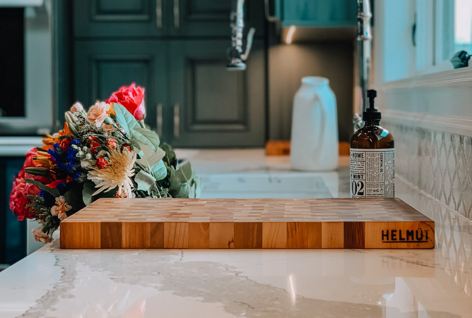 butcher block 36 inch cutting board on kitchen counter with bouquet of flowers