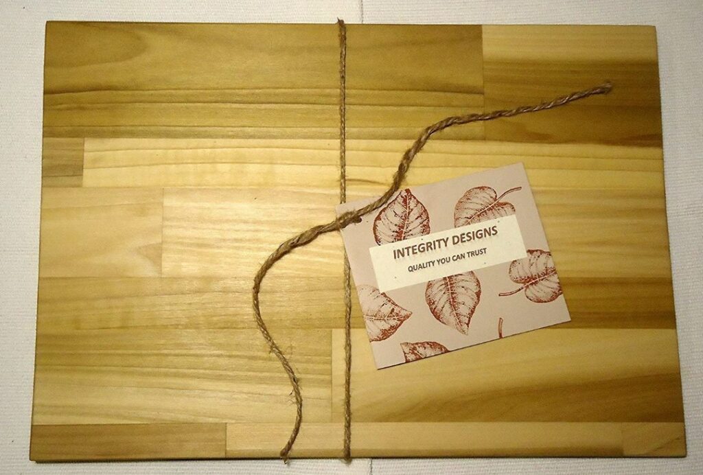 Intergrity Design Brand Wooden Cutting Board with label tied on with string