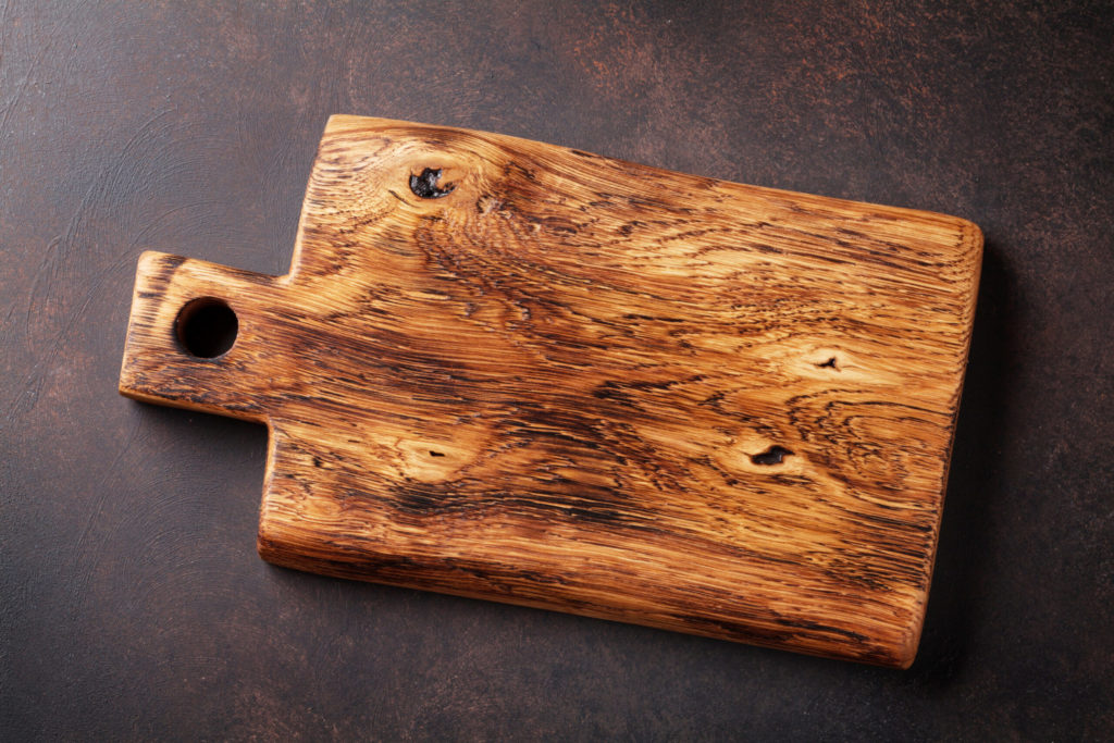 wooden cutting board with handle and hole 