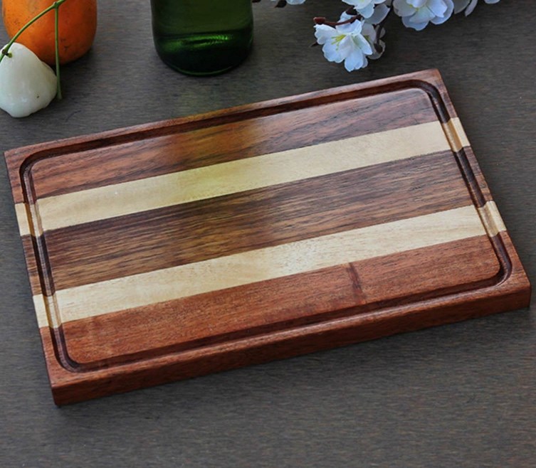 multicolored wooden cutting board