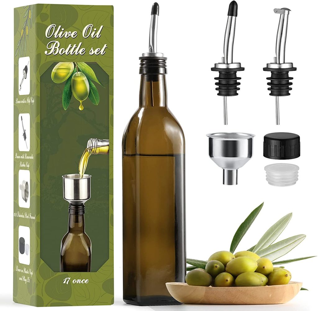 oilve oil dispenser styled with bowl of olives and original packaging