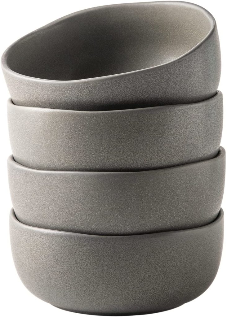 stack of four grey ceramic bowls