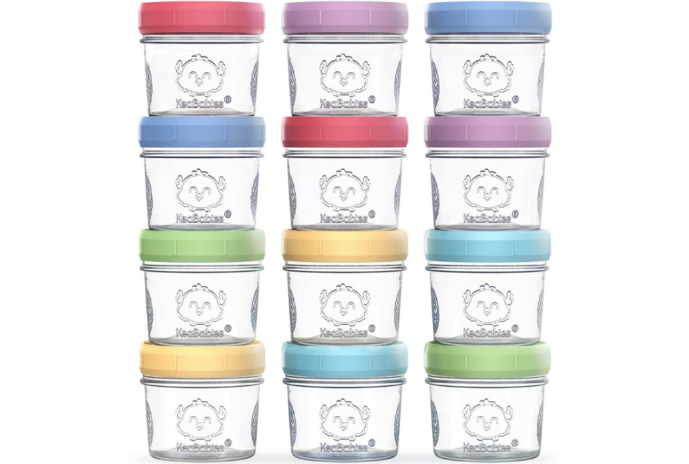 stacks of glass baby food jars with assorted pastel lids