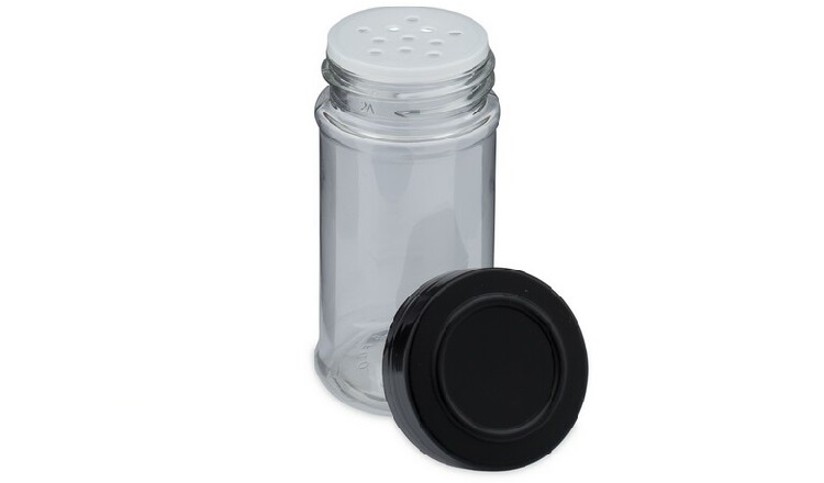 single spice jar with black lid off