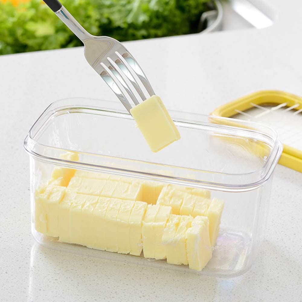 fork holding individual pats of butter in plastic holder 