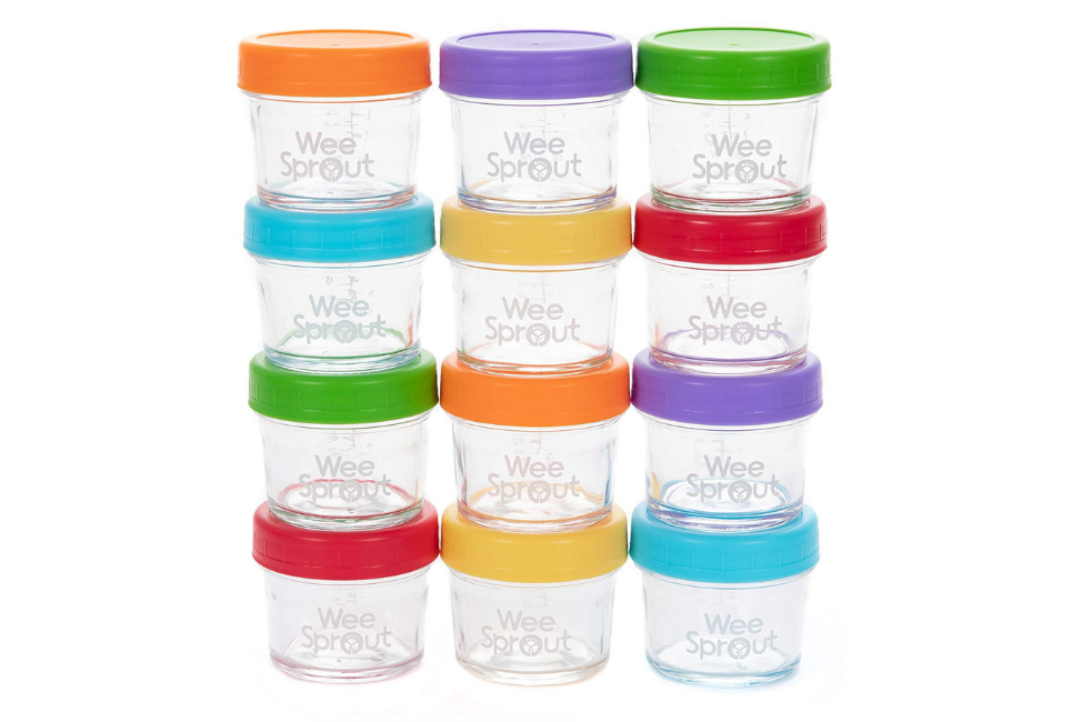 stacks of glass baby food jars with assorted colorful lids