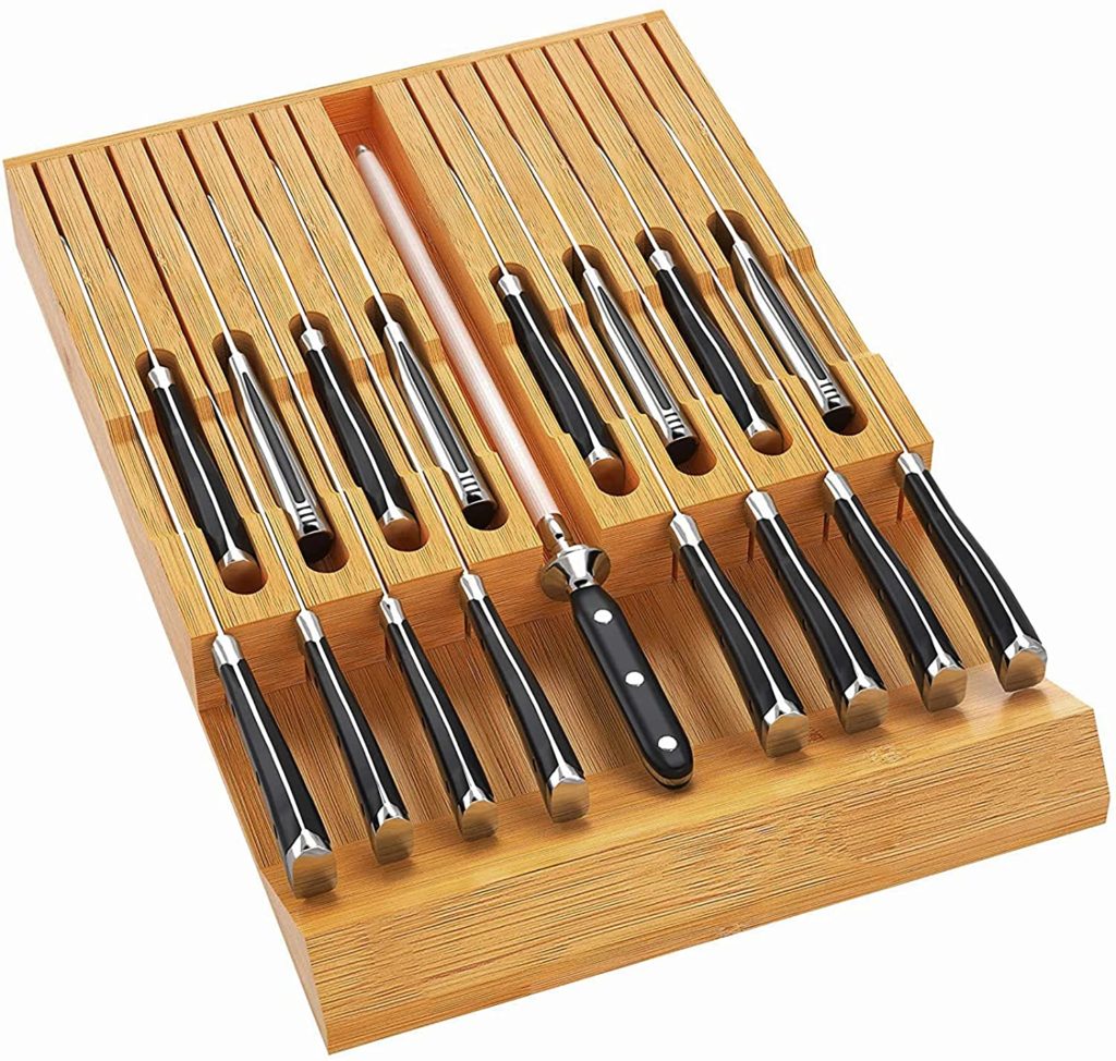 knives and sharpener stored in bamboo holder