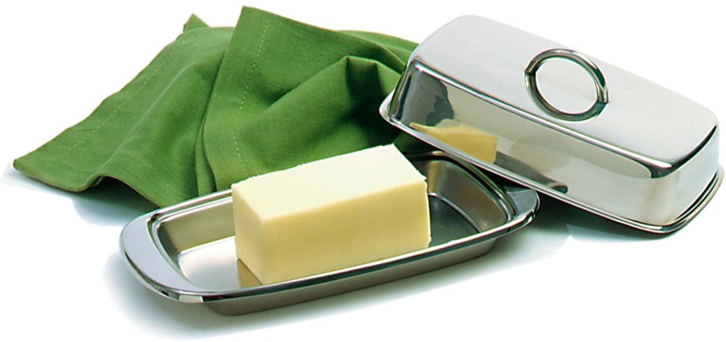stainless steel butter dish with green napkin