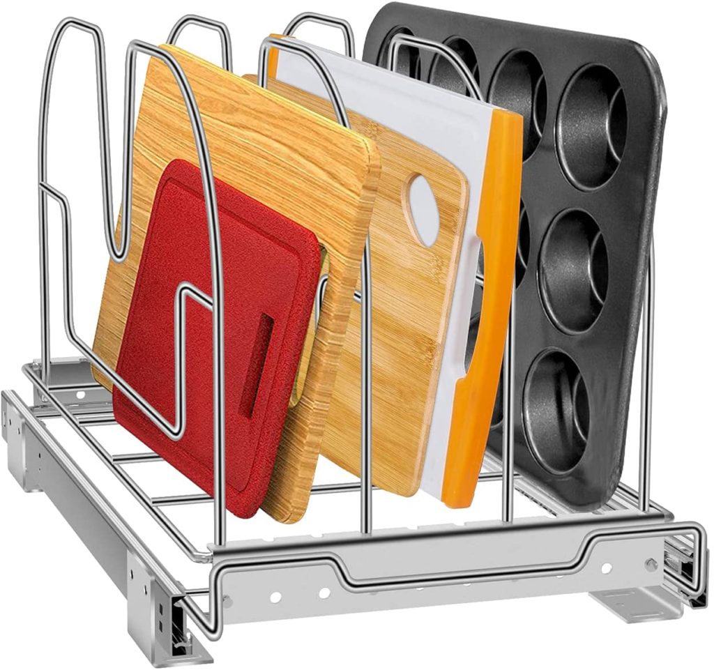baking dishes and cutting boards stored in pull out metal rack