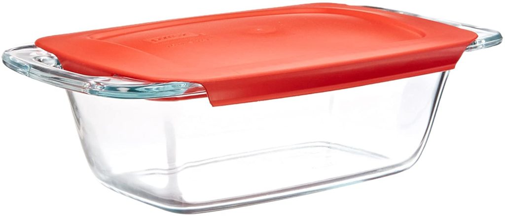 clear glass loaf pan with red plastic lid
