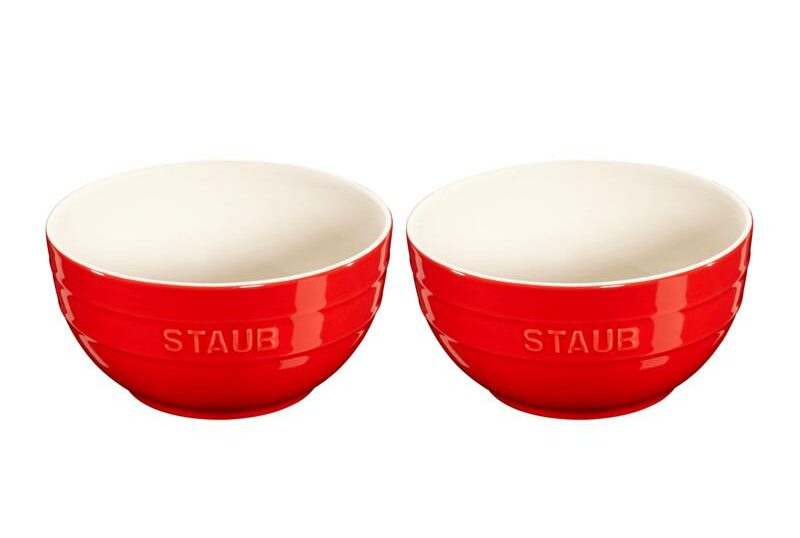 two red staub brand bowls