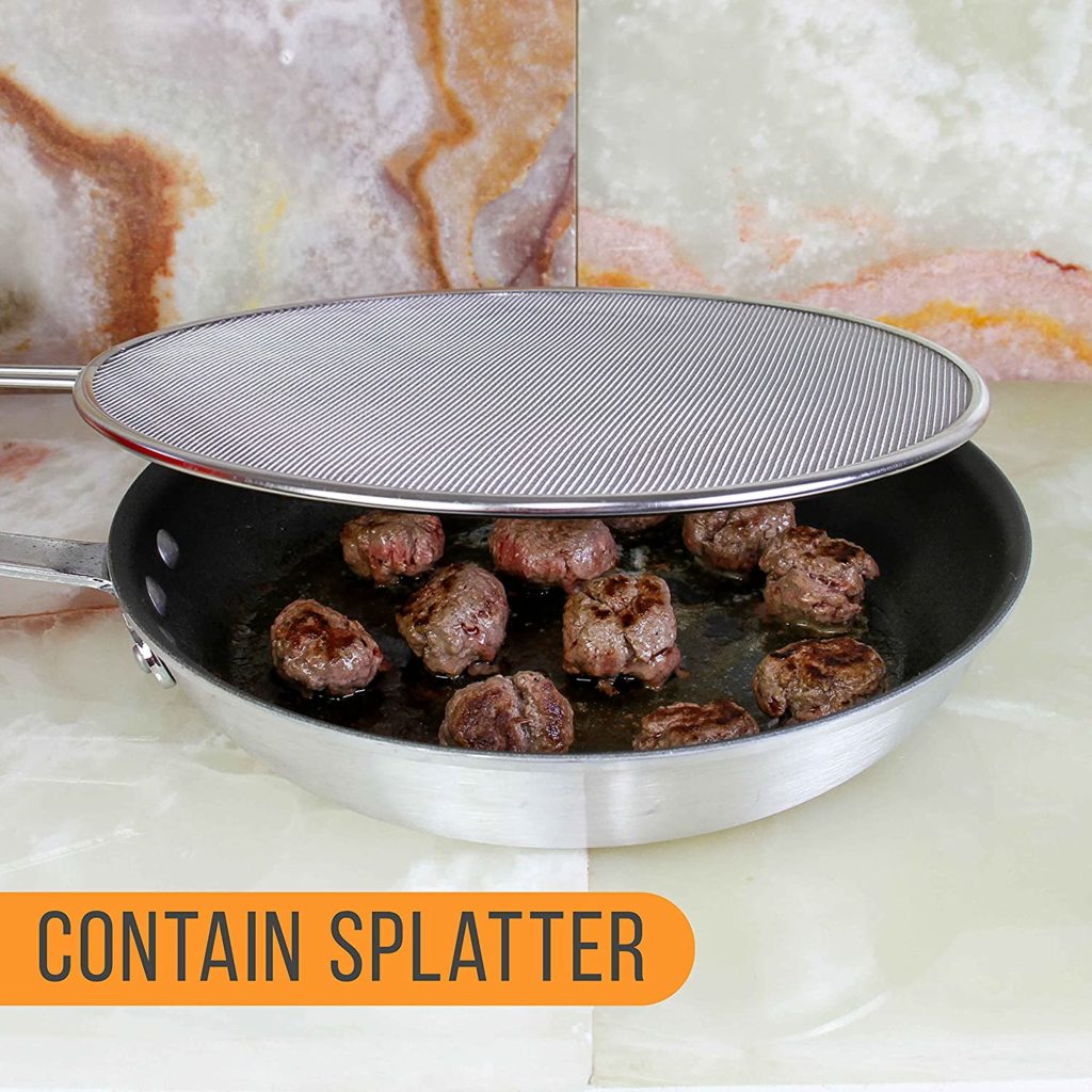 meatballs frying on pan with grease splatter screen