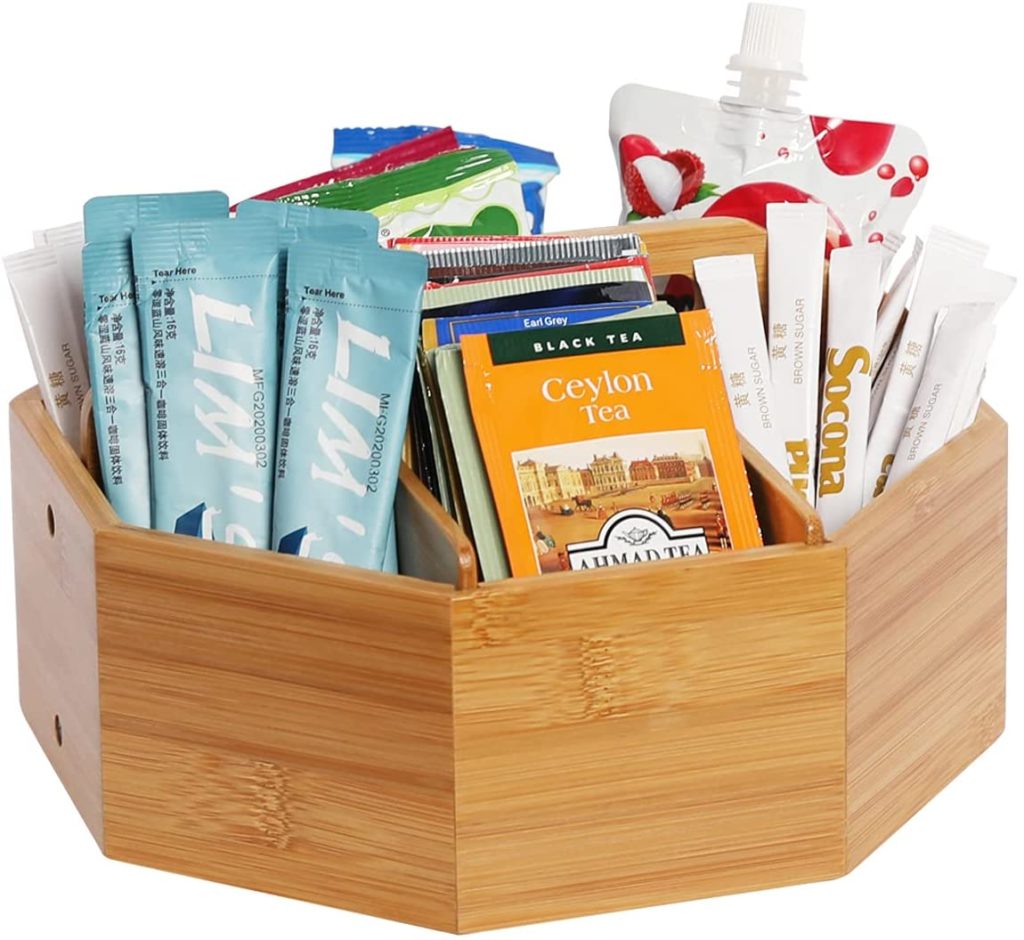 hexagonal bamboo tea caddy full of satchels and tea bags