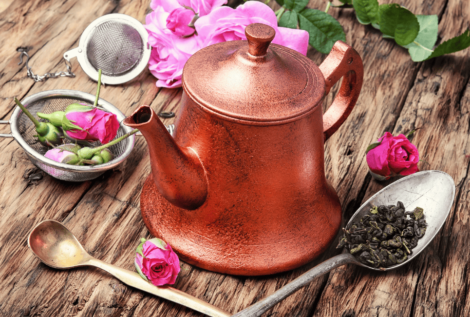 copper tea ketttle styled with loose tea