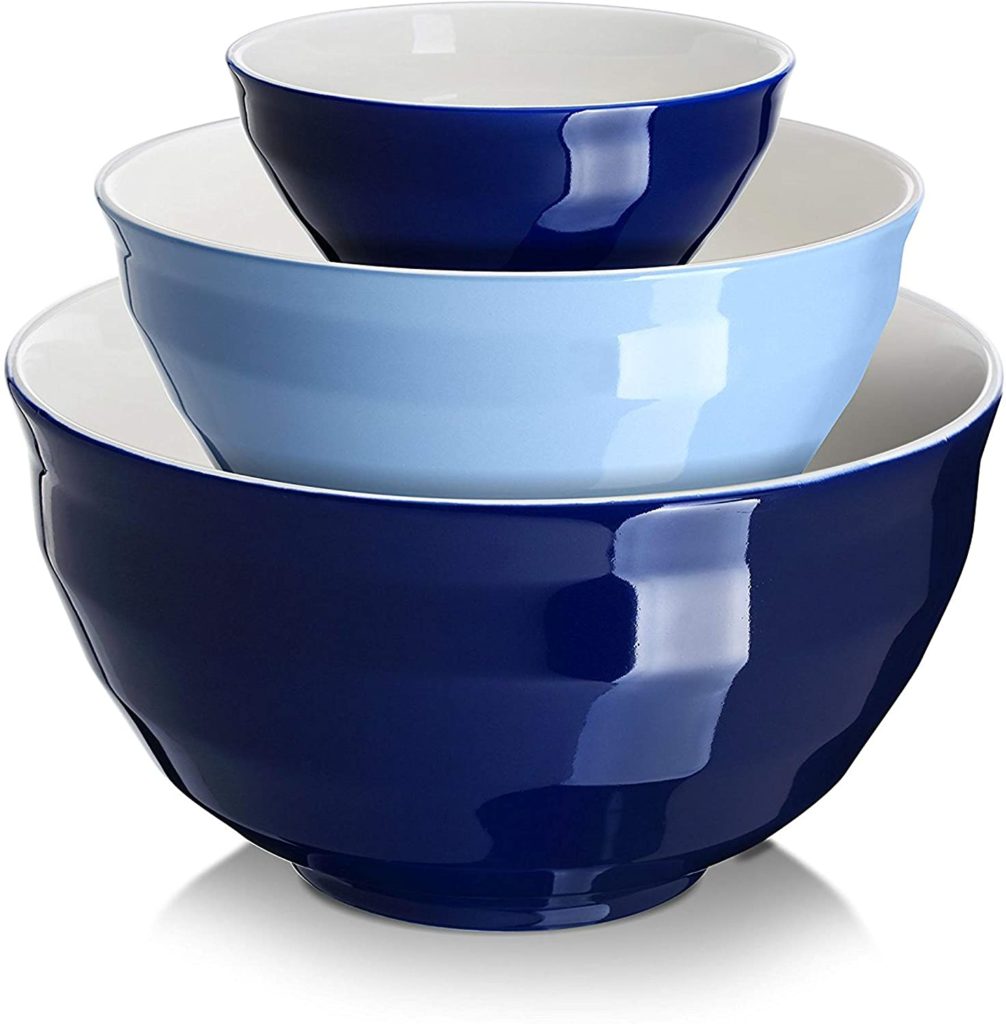 three blue nested mixing bowls