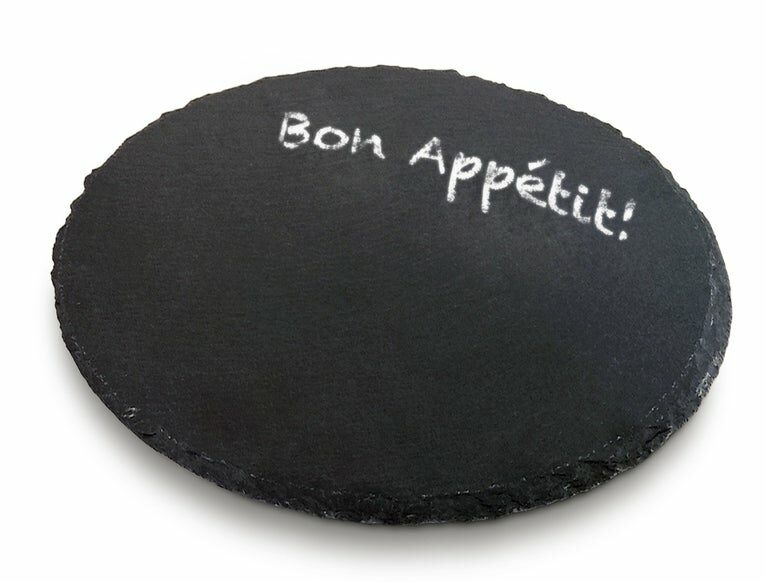 black stone lazy susan with chalk writing reading "bon appetit"