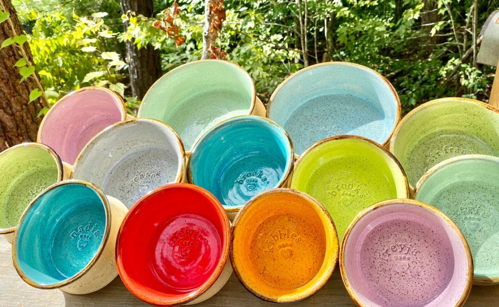 collection of multicolored ceramic bowls