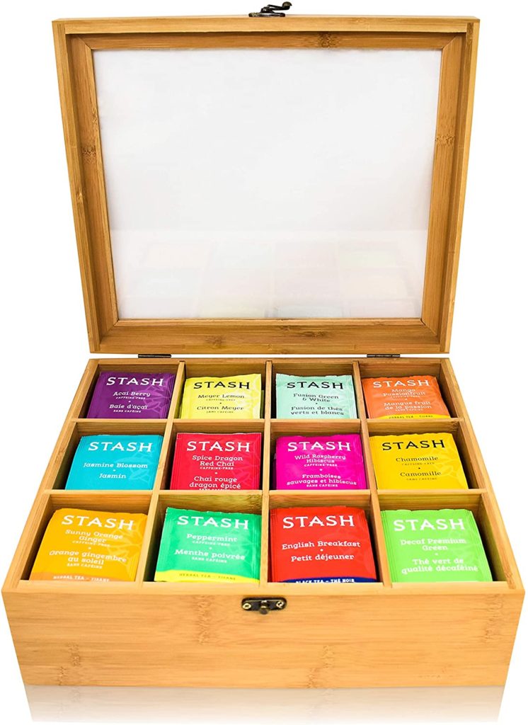 tea bags in wooden tea box organizer with open lid