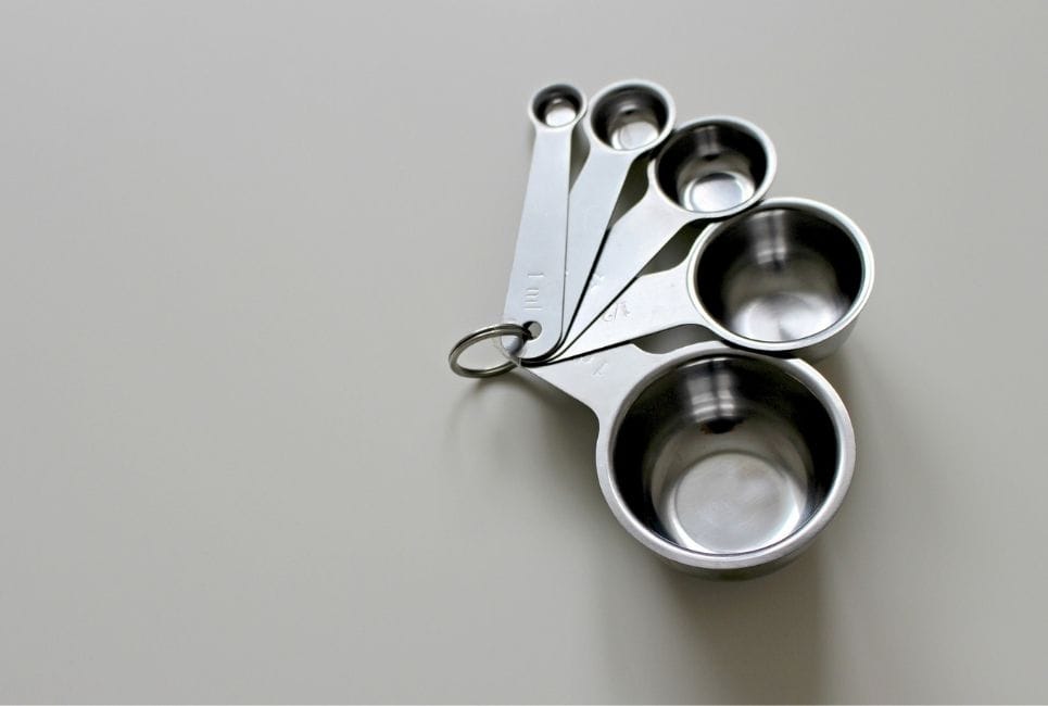 stainless steel measuring cups on a ring