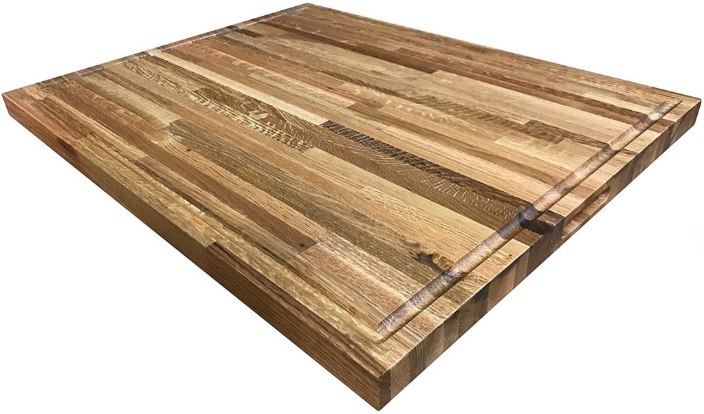 butcher block cutting board with moat around rim