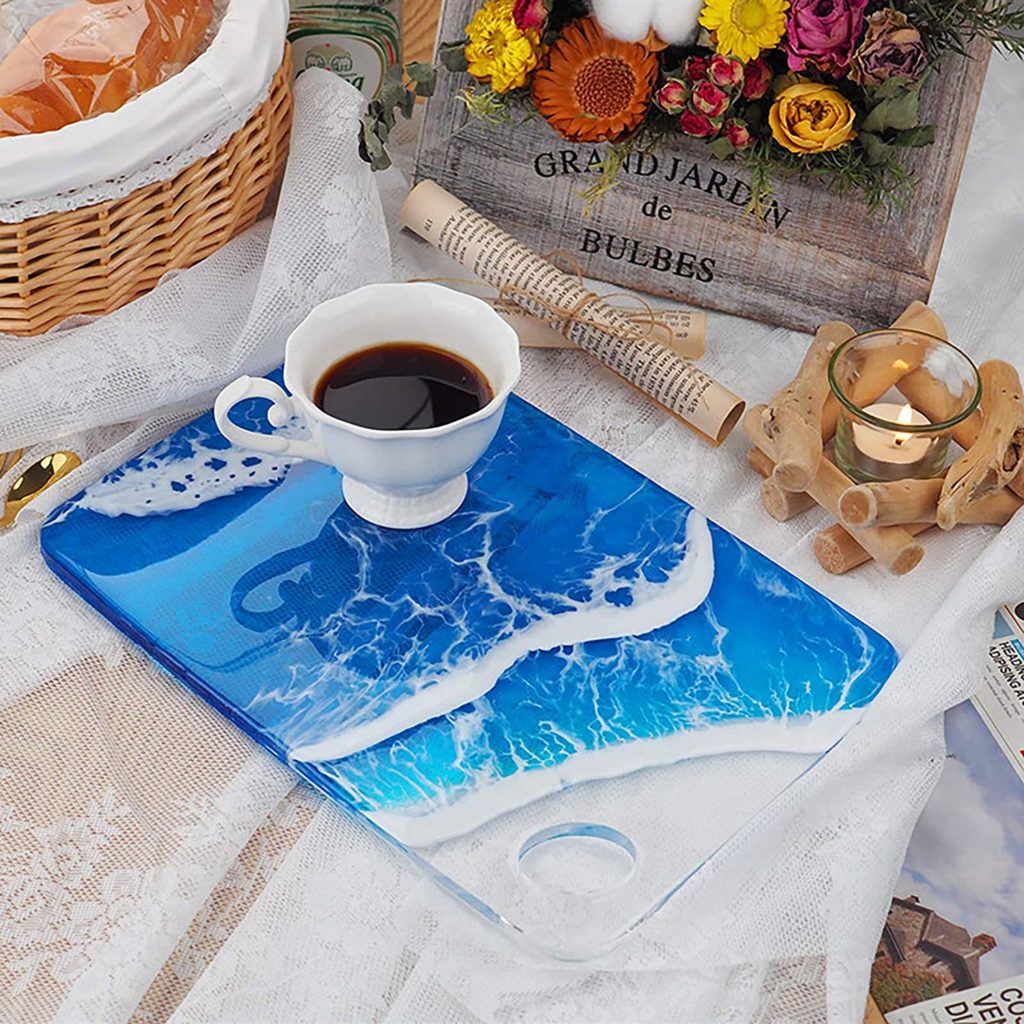coffee cup on blue and white epoxy cutting board