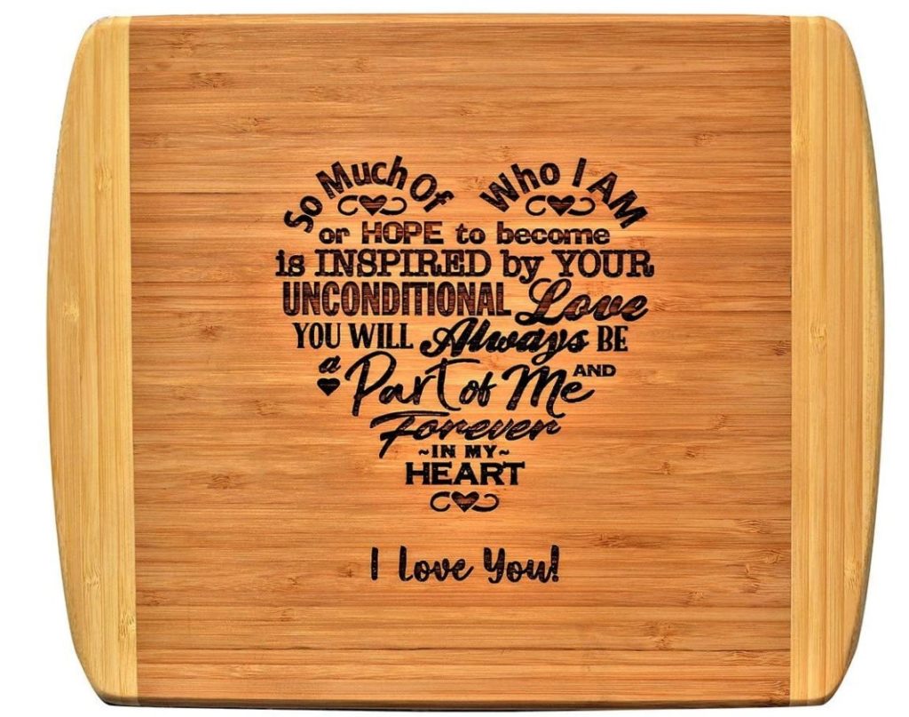 heart shaped poem about a mothers love burnt into wooden cutting board
