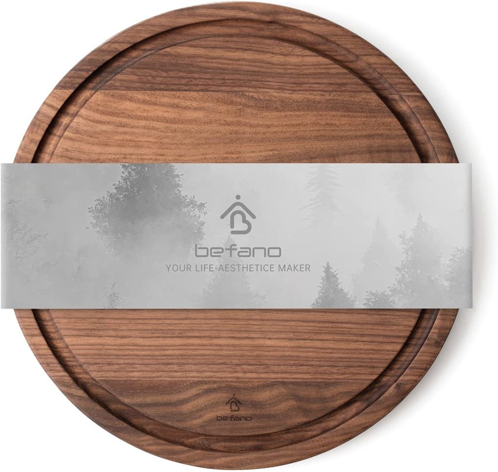 round walnut cutting board with sleeve packaging