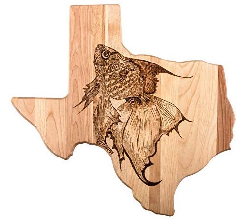 texas state shaped wooden cutting board with intricate fish design burnt in