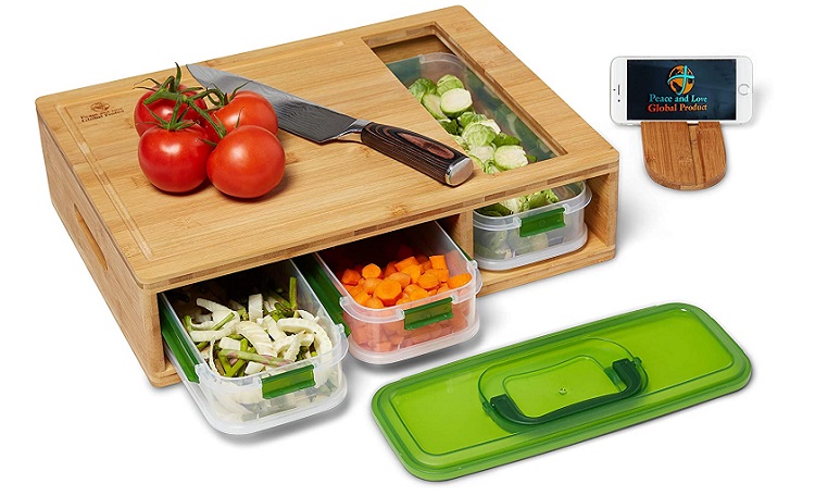 thick bamboo cutting board with plastic pullout containers holding produce