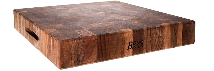 thick walnut butcher block cutting board with built in handles