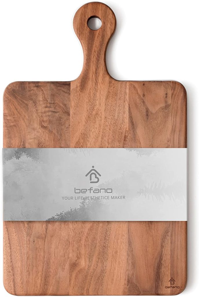 walnut cutting board with handle and sleeve packaging