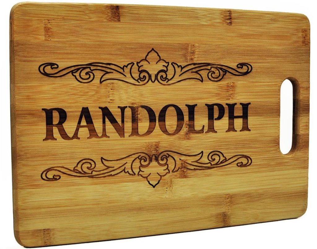 wooden cutting board with RANDOLPH burnt into it