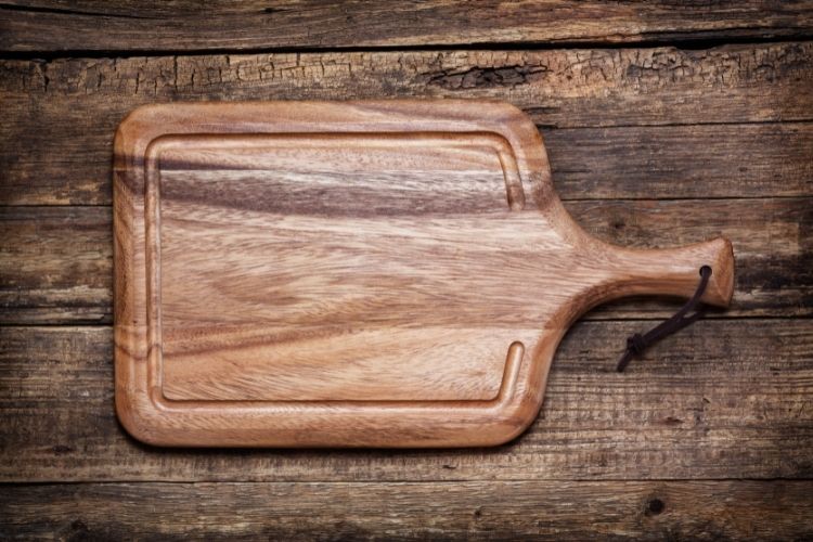 wooden handled cutting board