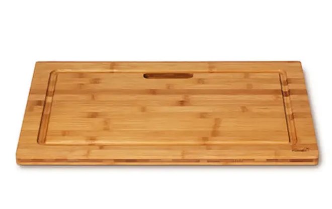 wooden rectangular cutting board with juice groove